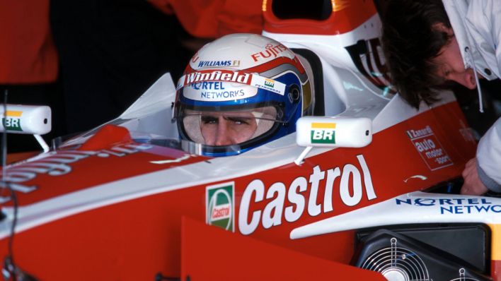 Der Formel-1-Pilot Alessandro Zanardi im Cockpit seines Williams, bei einer Testfahrt in Barceloa am 26.01.1999 (Quelle: imago images / Pius Koller).