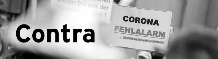 «Corona Felalarm» steht bei einer Kundgebung gegen die Corona-Maßnahmen am Breitscheidplatz auf einem Schild (Quelle: dpa/Christoph Soeder)
