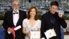 Archivbild: Michael Haneke mit Schauspielerin Isabelle Huppert und Schauspieler Benoit Magimel bei den Filmfestspielen in Cannes 2001. (Quelle: dpa/epa)