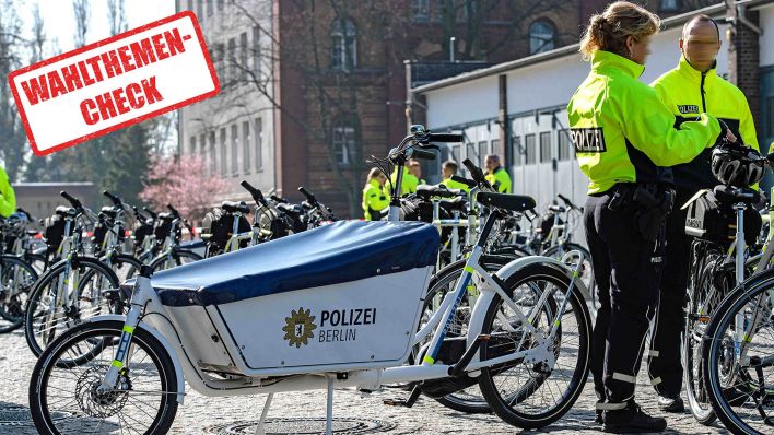 Symbolbild:Mitglieder der Polizei-Fahrradstaffel stehen an einem Lastenfahrrad.(Quelle:dpa/P.Zinken)