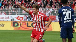 Kevin Behrens jubelt über seinen Treffer gegen Mainz 05. Quelle: imago images/Contrast
