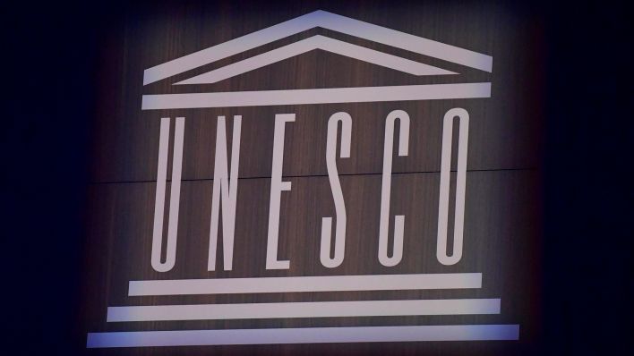 Symbolbild: Logo von Unesco (Quelle: dpa/Julien de Rosa)