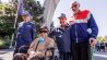 Vier Veteranen stehen bei einem Festakt anlässlich des 75 Jahrestages der Berlin-Blockade am 12.05.2024 in Tempelhof zusammen. Vor 75 Jahren endete die Berlin-Blockade (Quelle: dpa / Carsten Koall).