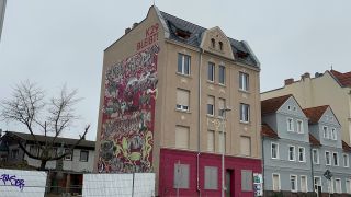 Schriftzug "K29 bleibt" an einer Hausfassade (Quelle: Wohnprojekt K29 Cottbus)